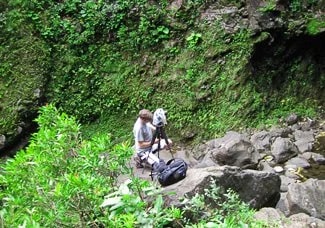 Carl photographing Wailua Falls. Photo by Bev Amoth