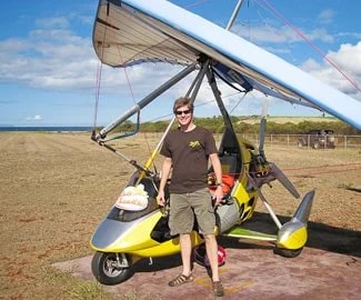 Carl after his ultralight aircraft flight. Photo by Gene Monnier.