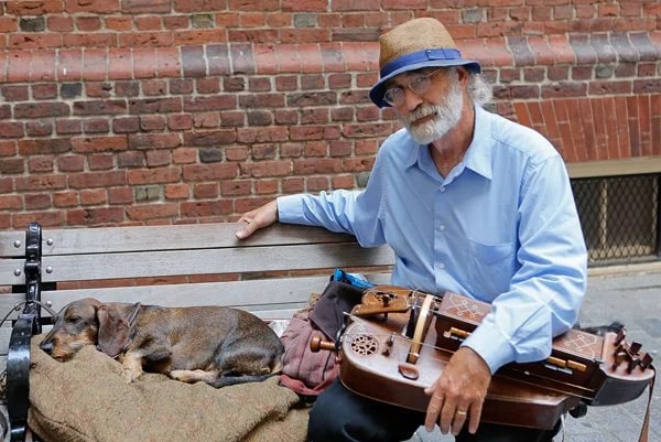 Gentleman Playing the Hurdy Gurdy, with best friend Mac the Knife by his side