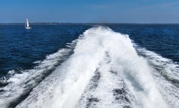 The high-speed ferry making waves with Cape Cod on the horizon.