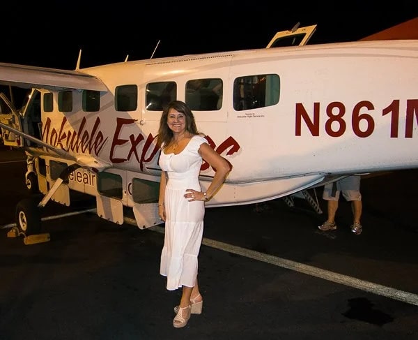 Bev next to our ride to Kona: Mokulele Airline's Cessna 208B Grand Caravan