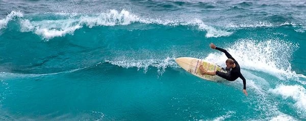 Surfer near Ho'okipa Beach, Maui. © Carl Amoth